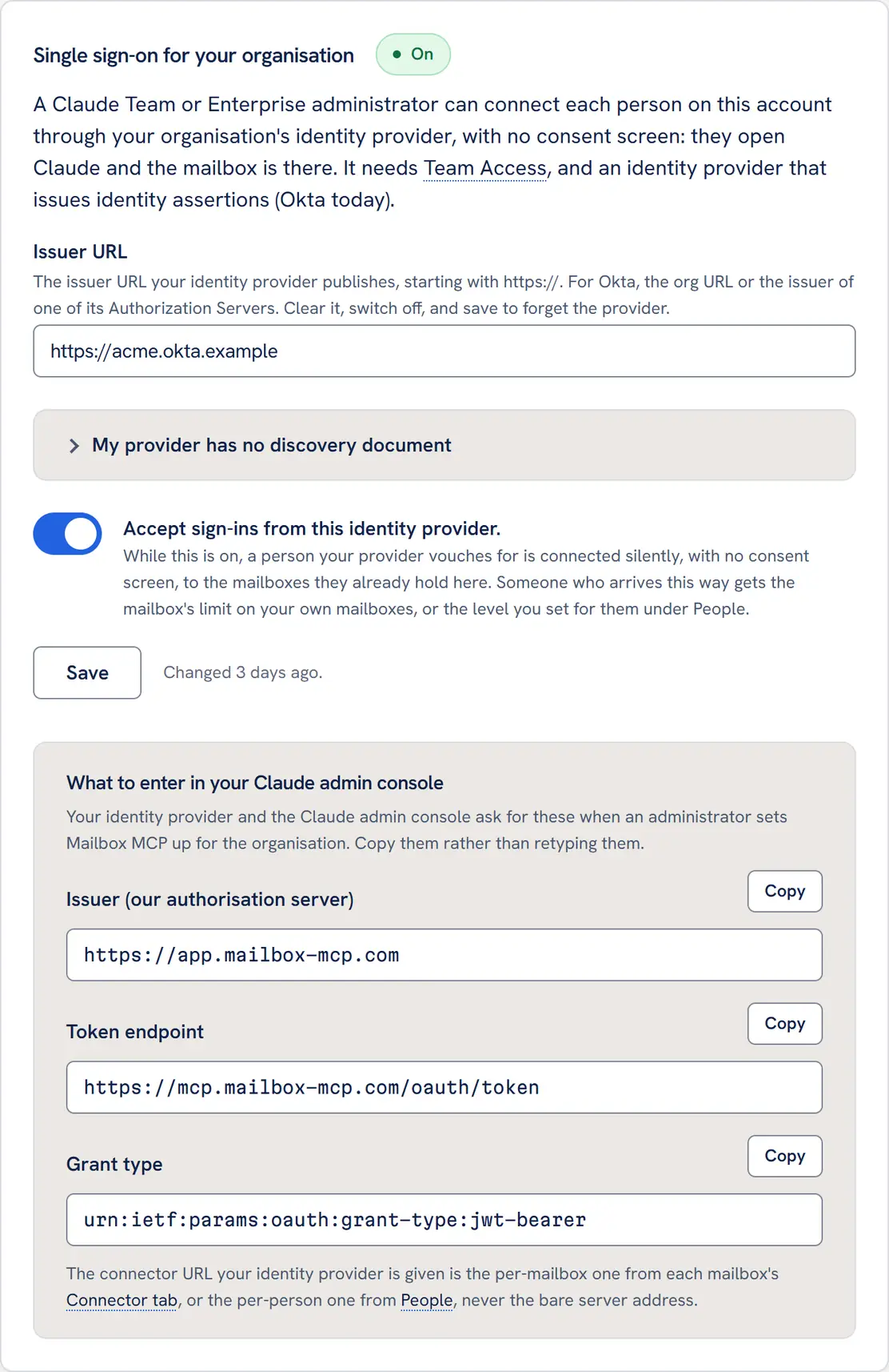 The single sign-on card under Settings in the Mailbox MCP control panel, marked On: a paragraph saying a Claude Team or Enterprise administrator can connect each person on the account through the organisation's identity provider with no consent screen; an Issuer URL field holding https://acme.okta.example; a closed disclosure headed My provider has no discovery document; a switch, on, beside Accept sign-ins from this identity provider; Save, with Changed 3 days ago; and a block headed What to enter in your Claude admin console listing the issuer, the token endpoint and the grant type, each with a Copy button.